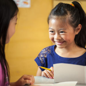 Lifestyle Square Girl Smiling Schoolwork